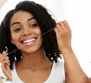 What Does Flossing Actually Do in Houston TX?